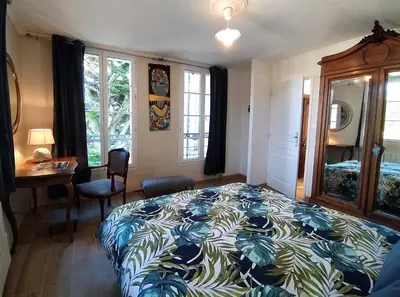 Un ou plusieurs lits dans un hébergement de l'établissement VILLA la Vigie Location de vacances bord de mer plage Utah Beach Normandie