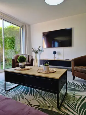 Télévision ou salle de divertissement dans l'établissement La Maison Entre Terre & Mer
