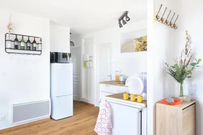Cuisine ou kitchenette dans l'établissement L'Harmonie - A 5min de la plage