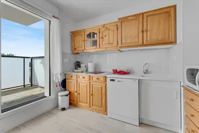 Cuisine ou kitchenette dans l'établissement Retraite Paisible à Dives sur Mer pour 4 pers
