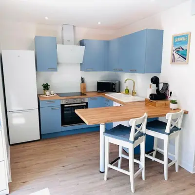 Cuisine ou kitchenette dans l'établissement Appartement Au Cœur de Granville