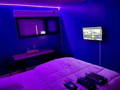 Télévision ou salle de divertissement dans l'établissement Chambre Rozanna