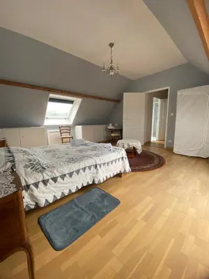 Un ou plusieurs lits dans un hébergement de l'établissement La Maison d'Aimé - Spacieuse et grand jardin