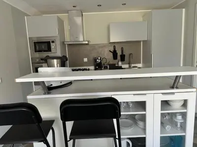 Cuisine ou kitchenette dans l'établissement Maison proche mer