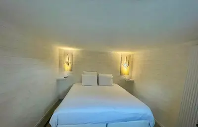 Un ou plusieurs lits dans un hébergement de l'établissement dday cottage gold beach
