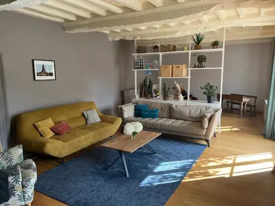 Coin salon dans l'établissement Le Gite du Pont