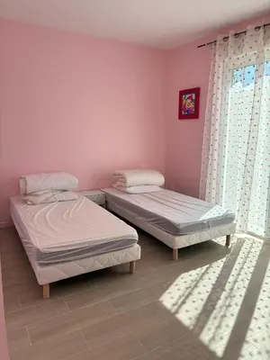 Un ou plusieurs lits dans un hébergement de l'établissement Maison familiale proche de Varaville avec jardin clos et terrasse