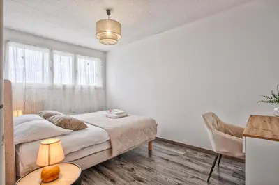 Un ou plusieurs lits dans un hébergement de l'établissement Appartement 
