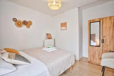 Un ou plusieurs lits dans un hébergement de l'établissement Appartement 