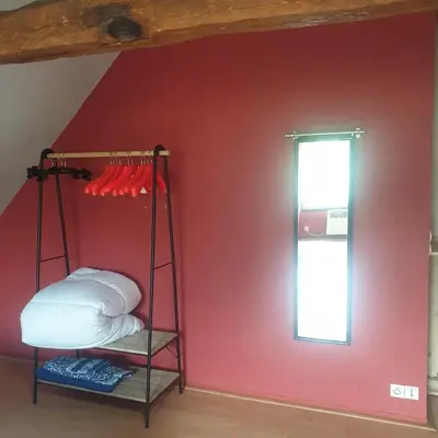 Un ou plusieurs lits dans un hébergement de l'établissement Gîte des Rochers