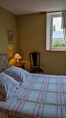 Un ou plusieurs lits dans un hébergement de l'établissement Chambre d'Hôtes La Closerie