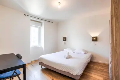 Un ou plusieurs lits dans un hébergement de l'établissement Casa Elisa