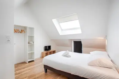 Un ou plusieurs lits dans un hébergement de l'établissement Casa Elisa