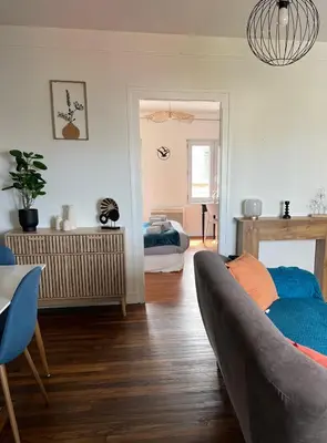 Coin salon dans l'établissement Appartement douillet