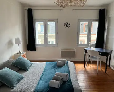 Coin salon dans l'établissement Appartement douillet
