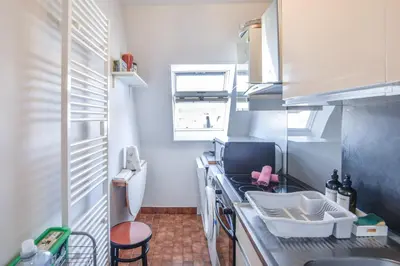Cuisine ou kitchenette dans l'établissement Sur la Promenade Proust - Appt vue mer