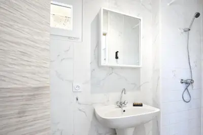 Salle de bains dans l'établissement Au Boulevard des Dunes - A 50m de la plage