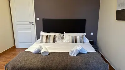 Un ou plusieurs lits dans un hébergement de l'établissement Appartement 8 personnes Normandie