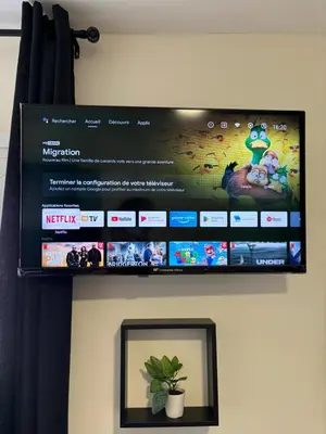 Télévision ou salle de divertissement dans l'établissement Escapade saint Michel
