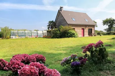 Jardin de l'établissement La Maison Merlin - Maison avec piscine Sénoville
