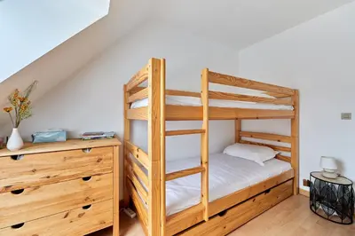 Un ou plusieurs lits dans un hébergement de l'établissement Le Repos de Cabourg - Appt à 650m de la plage