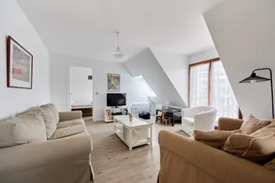 Télévision ou salle de divertissement dans l'établissement Le Repos de Cabourg - Appt à 650m de la plage