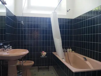 Salle de bains dans l'établissement Chambre d'Hôtes de l'Île