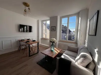 Télévision ou salle de divertissement dans l'établissement Appartement Richard Merrill 2 personnes en plein centre