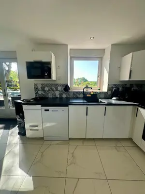 Cuisine ou kitchenette dans l'établissement Gîte des Hirondelles n