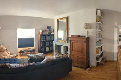 Coin salon dans l'établissement Duplex familial et confortable proche Zénith