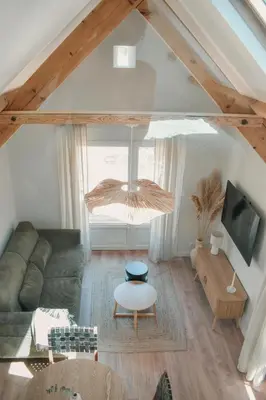 Coin salon dans l'établissement La Cabane - Gîtes des Havres