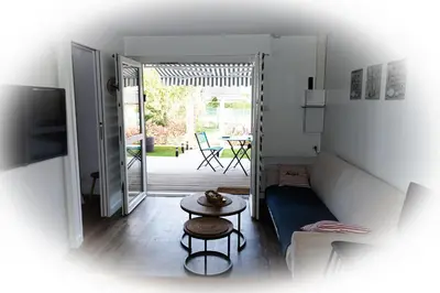 Coin salon dans l'établissement Bel appart près du port et de la plage