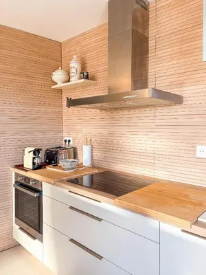 Cuisine ou kitchenette dans l'établissement Mer calme