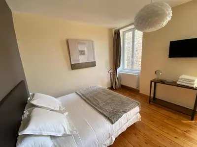 Un ou plusieurs lits dans un hébergement de l'établissement La villa des 3