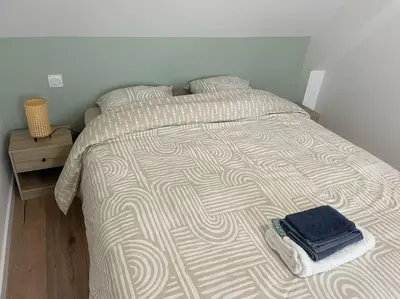 Un ou plusieurs lits dans un hébergement de l'établissement La Maisonnette des Grèves, 8 min du Mont St Michel