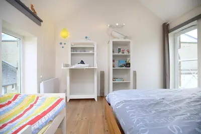 Un ou plusieurs lits dans un hébergement de l'établissement LA FERME DE LONGUES maisons spécialisées pour les familles avec jeunes enfants