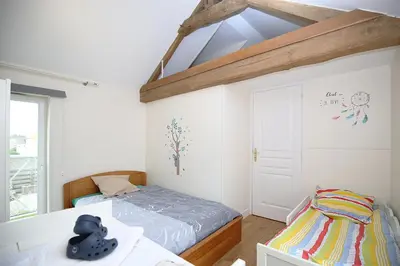Un ou plusieurs lits dans un hébergement de l'établissement LA FERME DE LONGUES maisons spécialisées pour les familles avec jeunes enfants