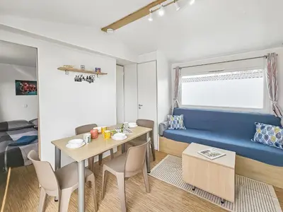 Coin salon dans l'établissement Oasis du Pêcheur avec Wifi gratuit