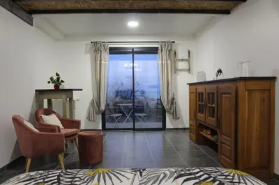 Coin salon dans l'établissement Chambre d'hôtes vue sur mer