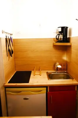 Cuisine ou kitchenette dans l'établissement Stosy Gare