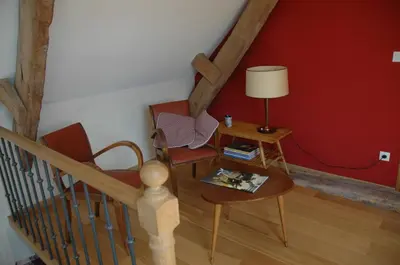 Coin salon dans l'établissement Chambre d'Hôte La Maison du Mesnil