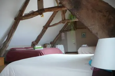 Un ou plusieurs lits dans un hébergement de l'établissement Chambre d'Hôte La Maison du Mesnil
