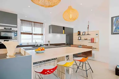 Cuisine ou kitchenette dans l'établissement Granville centre - Duplex 6 pers