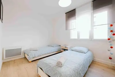 Un ou plusieurs lits dans un hébergement de l'établissement Granville centre - Duplex 6 pers