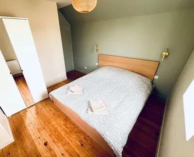 Un ou plusieurs lits dans un hébergement de l'établissement Villa La Bourrasque