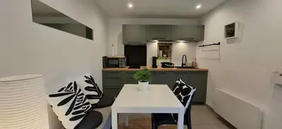 Cuisine ou kitchenette dans l'établissement Les gîtes de La Petite Taupe - Akotee