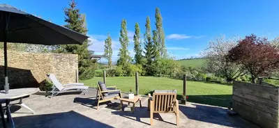 Jardin de l'établissement Les gîtes de La Petite Taupe - Akotee