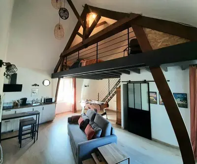 Coin salon dans l'établissement Loft proche Bayeux