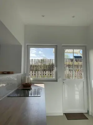 Cuisine ou kitchenette dans l'établissement Maison familiale cosy proche mer Agon Coutainville