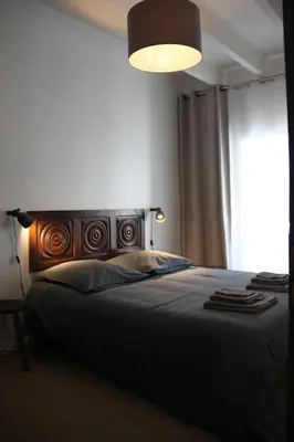 Un ou plusieurs lits dans un hébergement de l'établissement Maison au coeur de Cancale à 300m de la plage